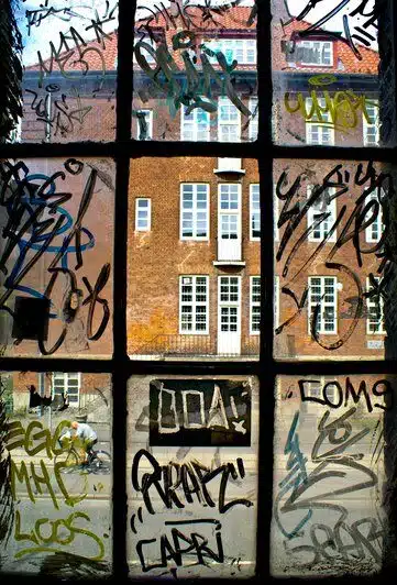 Graffiti shown on a window that could be easily fixable, if it had 3M Anti-graffiti film installed 